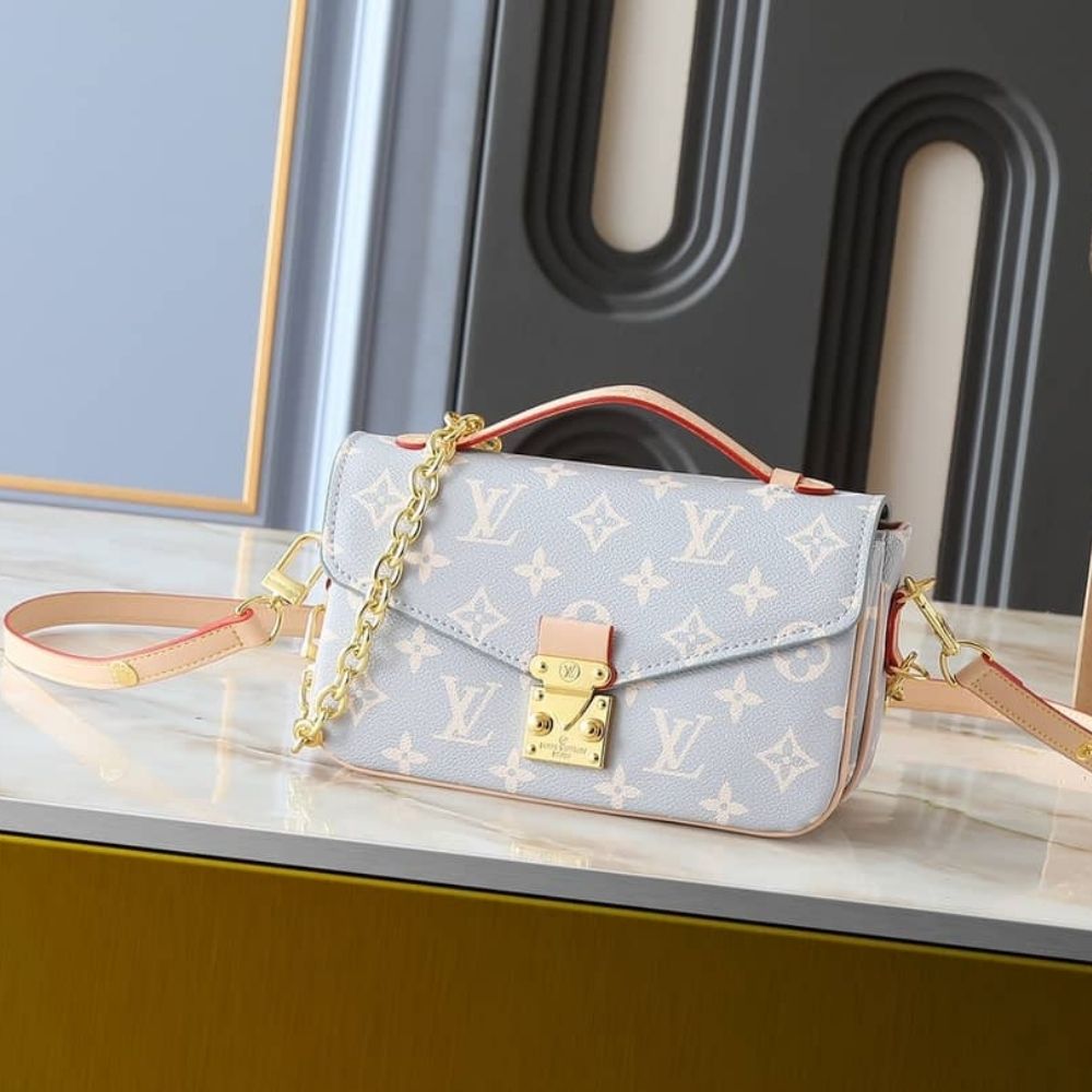 Alternative view of Louis Vuitton Pochette Métis East West Coated Canvas Trianon 21Cm M12429