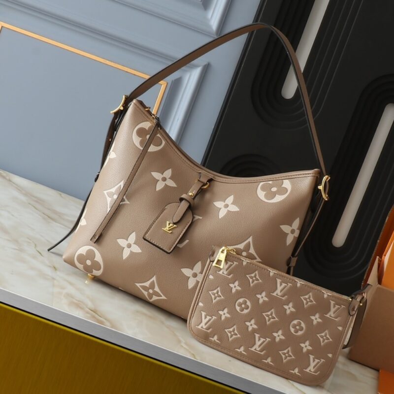 Alternative view of Louis Vuitton Carryall PM Bicolor Monogram Empreinte Dove And Cream 29Cm M47180