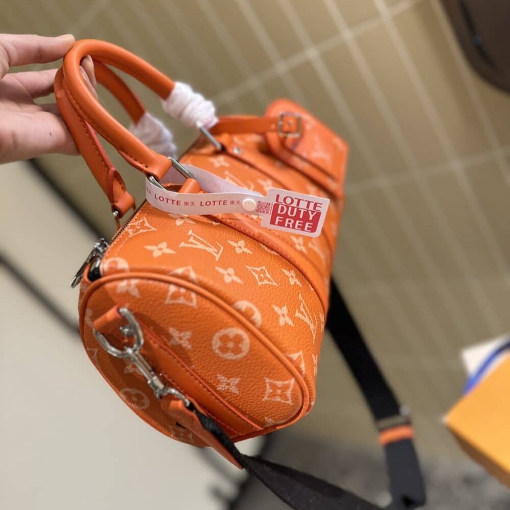 Alternative view of Louis Vuitton Keepall Bandoulière 25 Tangerine 25Cm M31044