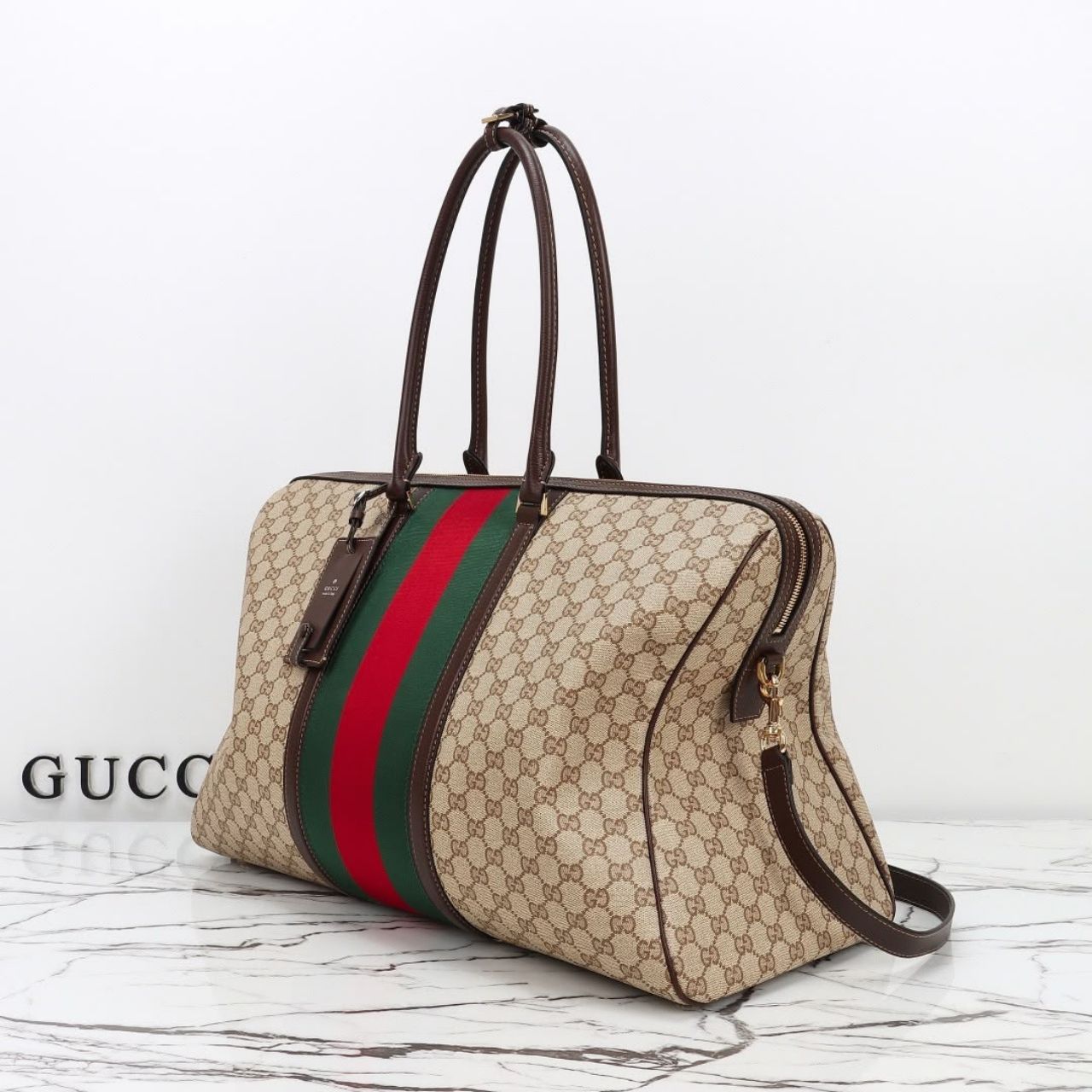 Prestige Edition – Gucci Medium GG Duffle Bag With Web Sand And Dark Brown 47cm - Image 4