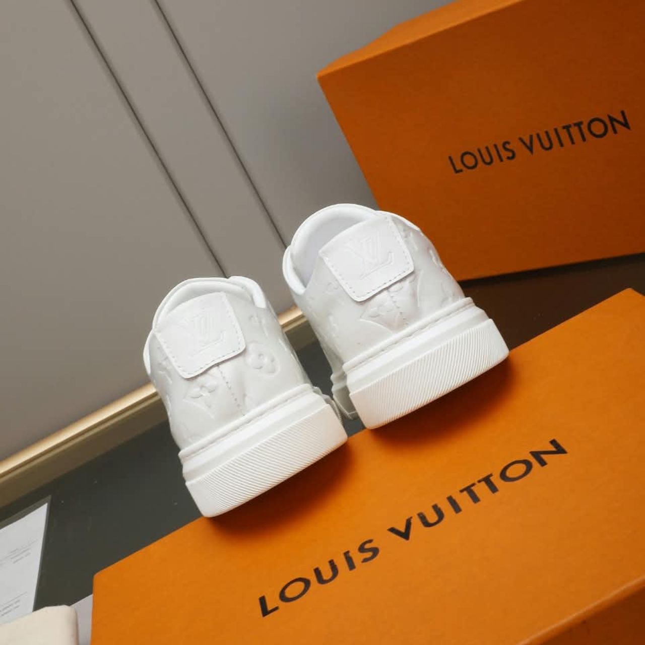 Louis Vuitton Monogram Embossed Low Top Sneakers White - Image 7