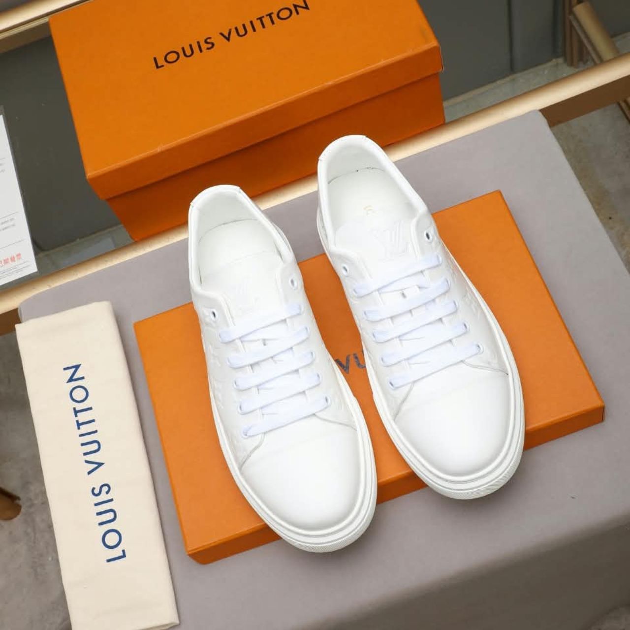 Louis Vuitton Monogram Embossed Low Top Sneakers White - Image 6