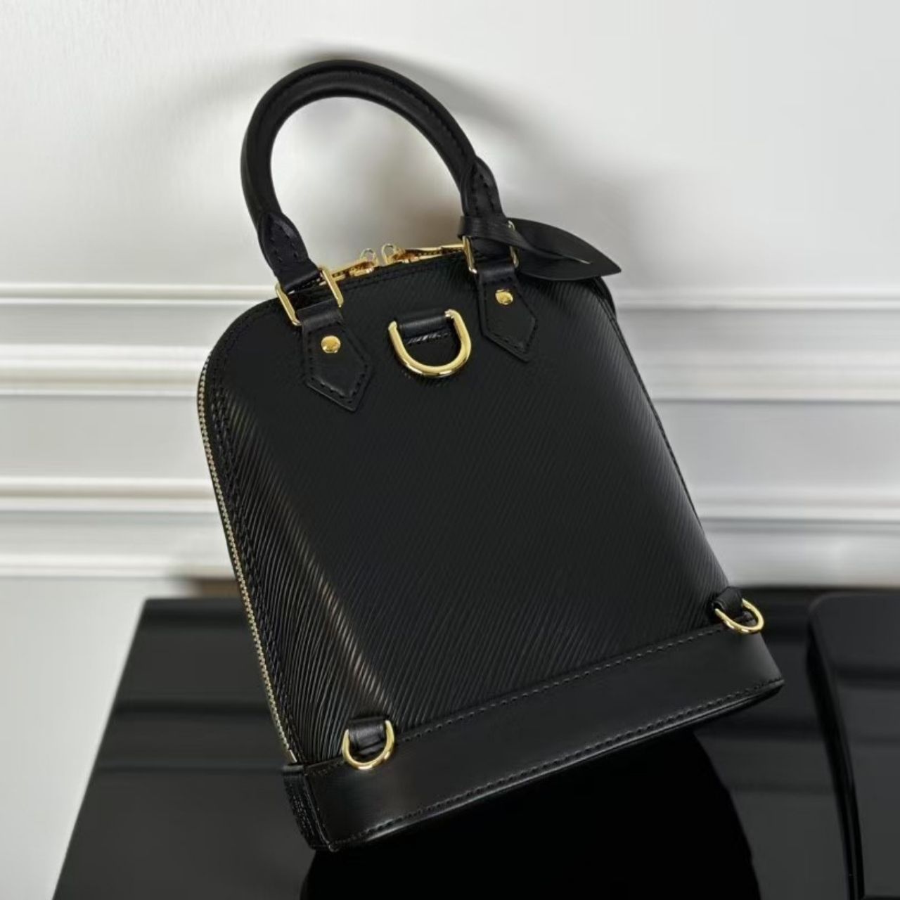 Prestige Edition – Louis Vuitton Alma Backpack Epi Leather Black 20Cm M25103 - Image 7